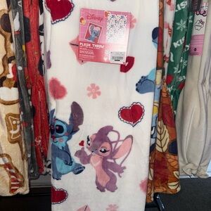 Disney Plush Throw - White with Blue and Pink Stitch Design